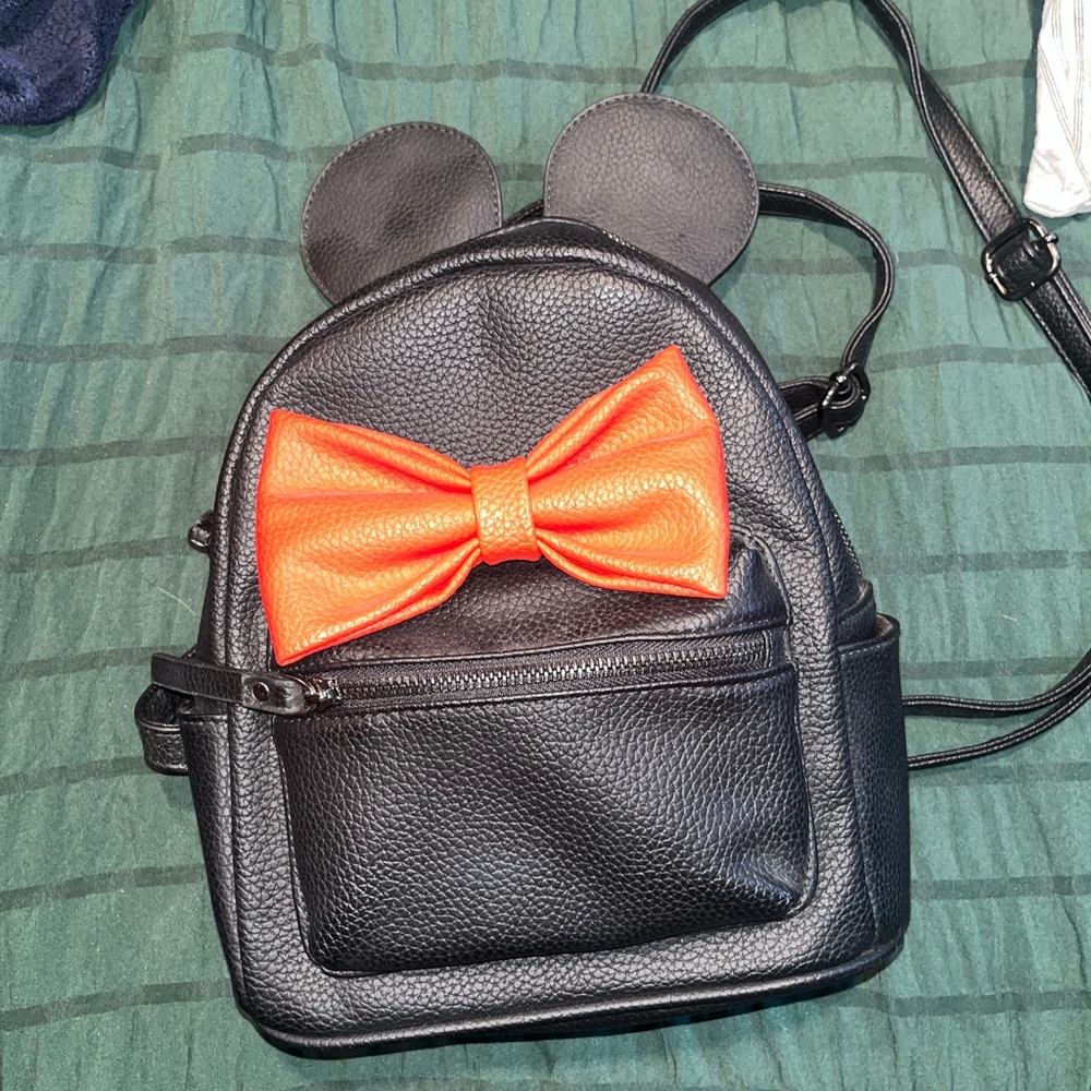 Black Backpack with Orange Bow